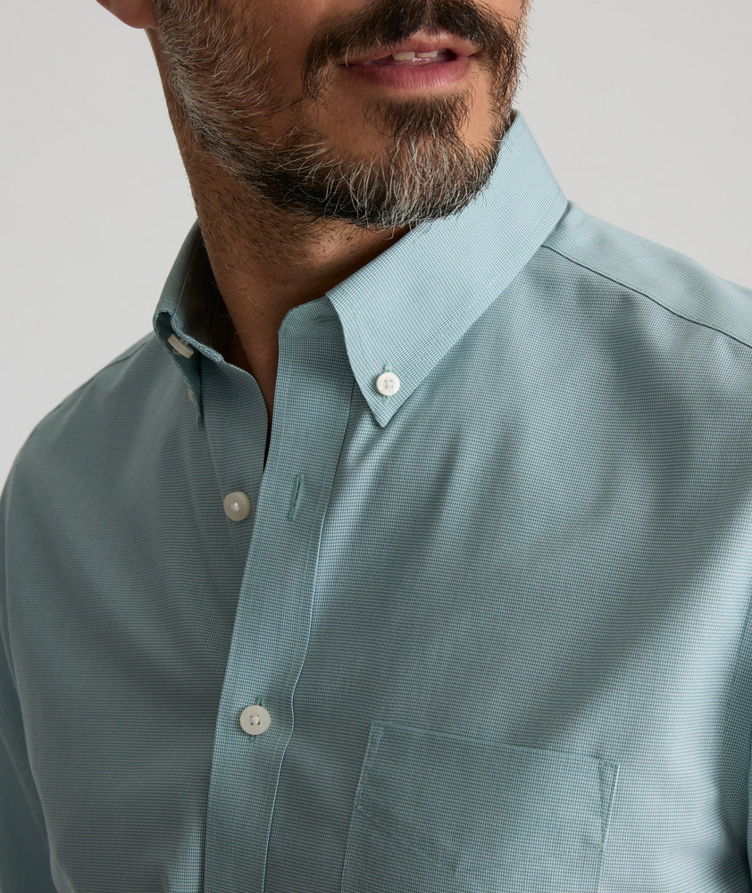 Model is wearing UNTUCKit Wrinkle-Free Cadetto Shirt in Light Green.