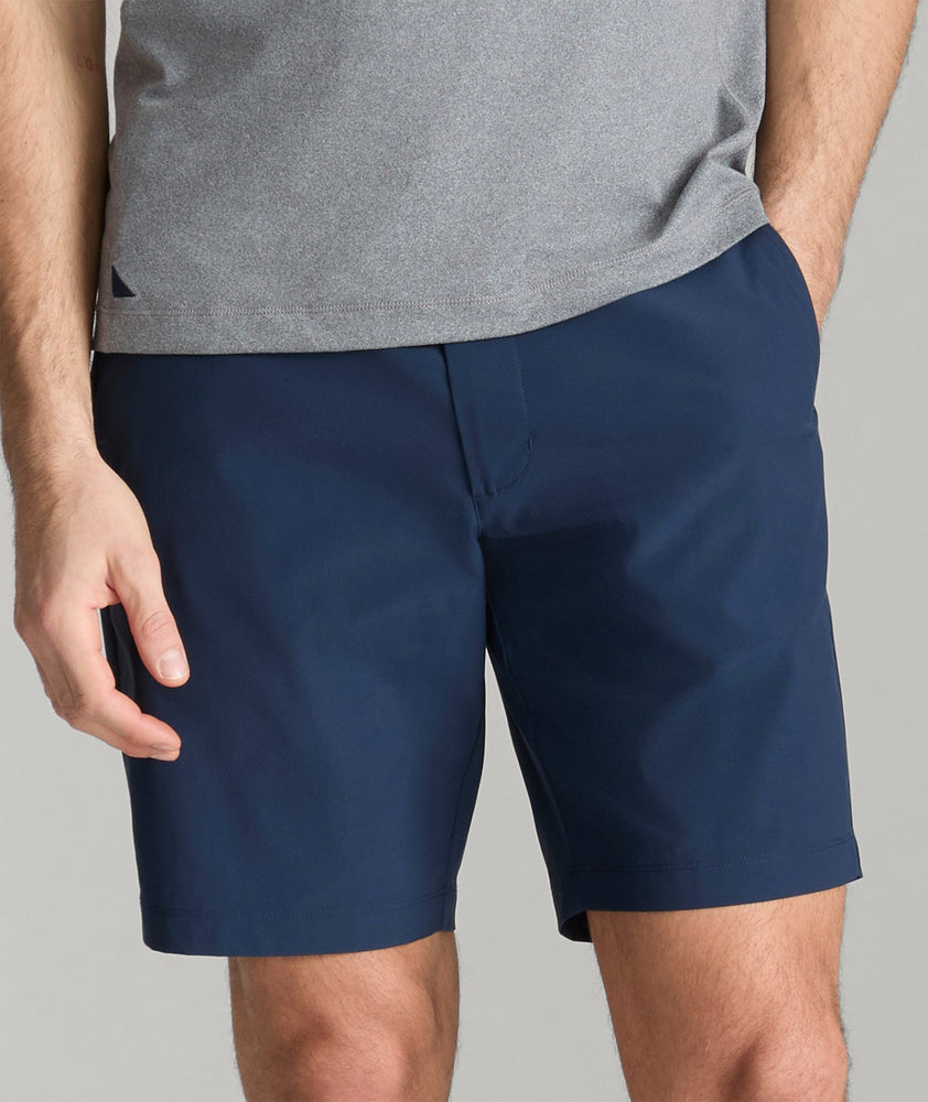 Model wearing UNTUCKit True Navy Traveler Shorts.