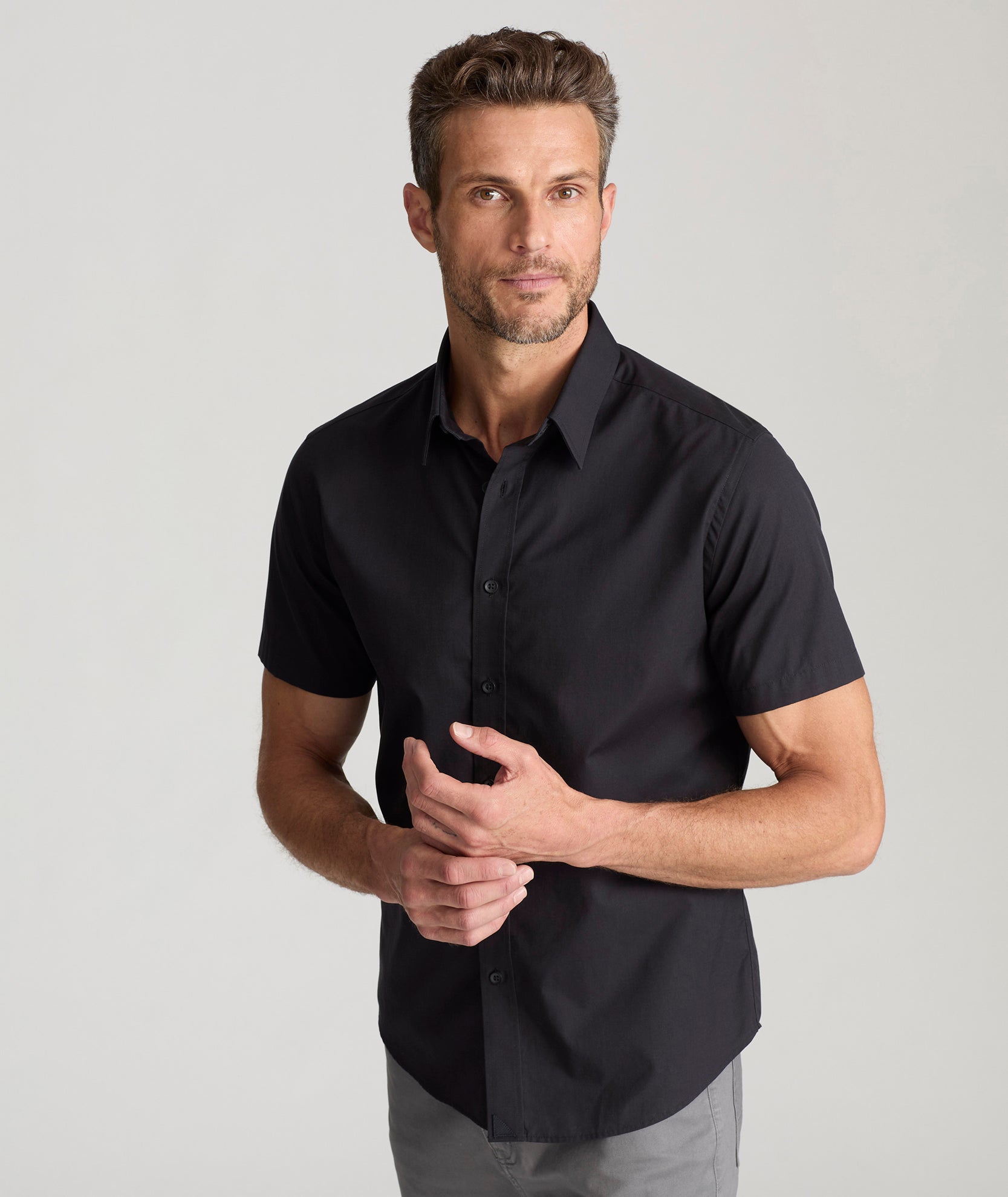 Black polo shirt button up best sale