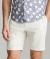 Model wearing UNTUCKit Stone 9" Chino Shorts