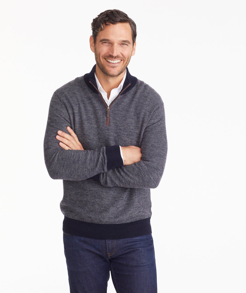 Model is wearing UNTUCKit Birdseye Merino Wool Quarter-Zip Sweater.