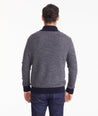 Model is wearing UNTUCKit Birdseye Merino Wool Quarter-Zip Sweater.