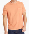 Model wearing an UNTUCKit Orange Mineral Dye Pocket Tee