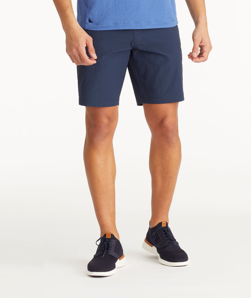 Model wearing UNTUCKit True Navy Traveler Shorts