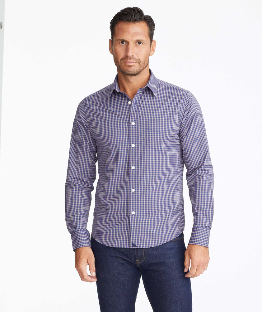 Model wearing a Navy Wrinkle-Free Performance Larkin Shirt