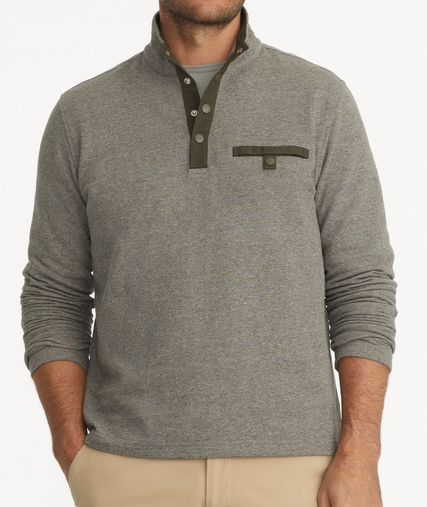 Model is wearing UNTUCKit Parkson quarter-zip sweatshirt in fog. 