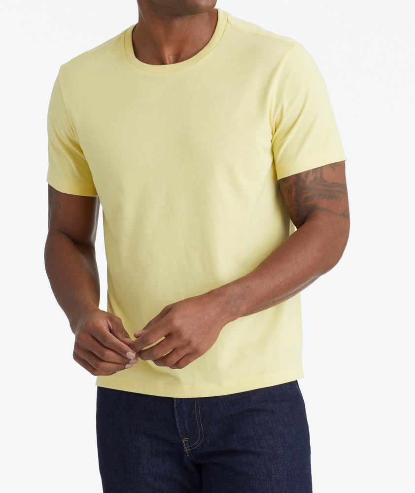 Model wearing a Light Yellow Ultrasoft Tee